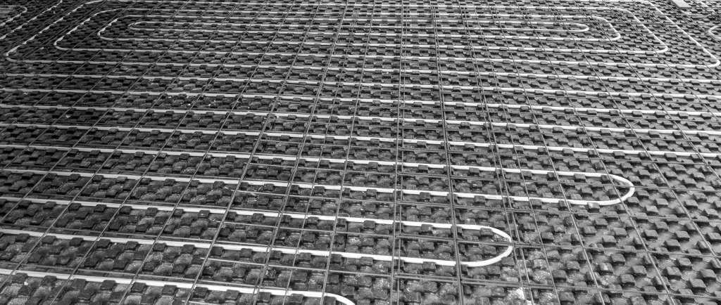 Hydrosol image of underfloor hydronic circuits laid prior to the concrete screed layer with heat pump for heating and reverse cycle cooling.