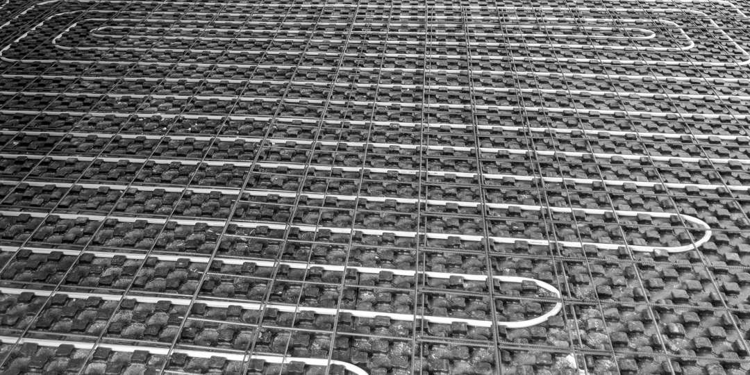 Hydrosol image of underfloor hydronic circuits laid prior to the concrete screed layer with heat pump for heating and reverse cycle cooling.
