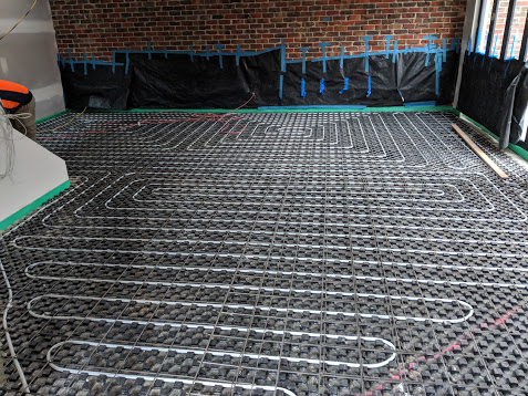 Energy efficient home, in-screed circuits