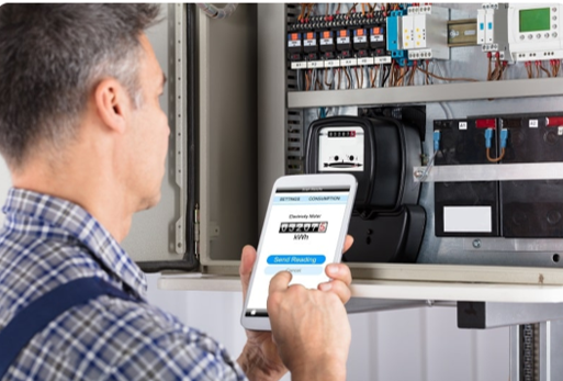 Image of technician undertaking measurement and verification involving planning, measuring systems and processes, collecting and analysing data, then verifying and reporting.