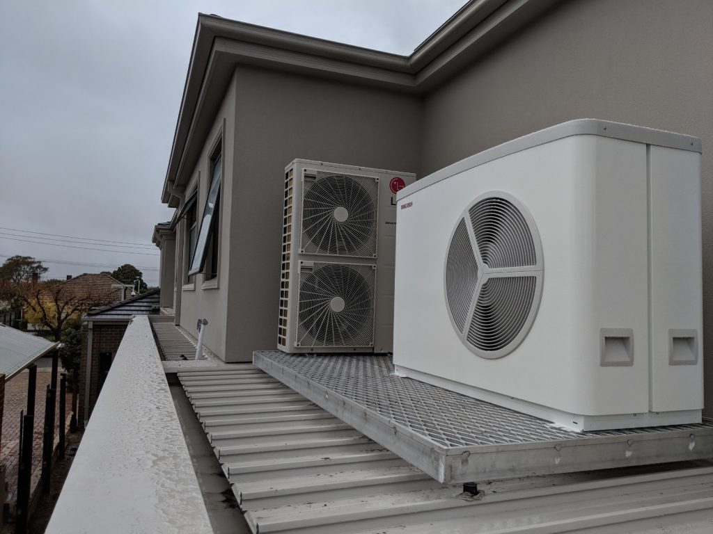 Hydrosol image of an LG aircon outdoor unit and Stiebel Eltron heat pump roof mounted on a vibration isolation platform.